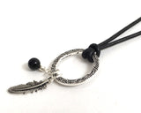 choker necklace Infinity circle pendant onyx gemstone charm feather charm on adjustable long black rope leather necklace by Athenais Jewlery and Art, choker necklace, long necklace base chakra necklace healing crystals love success protection happiness gift for her boho jewelry 